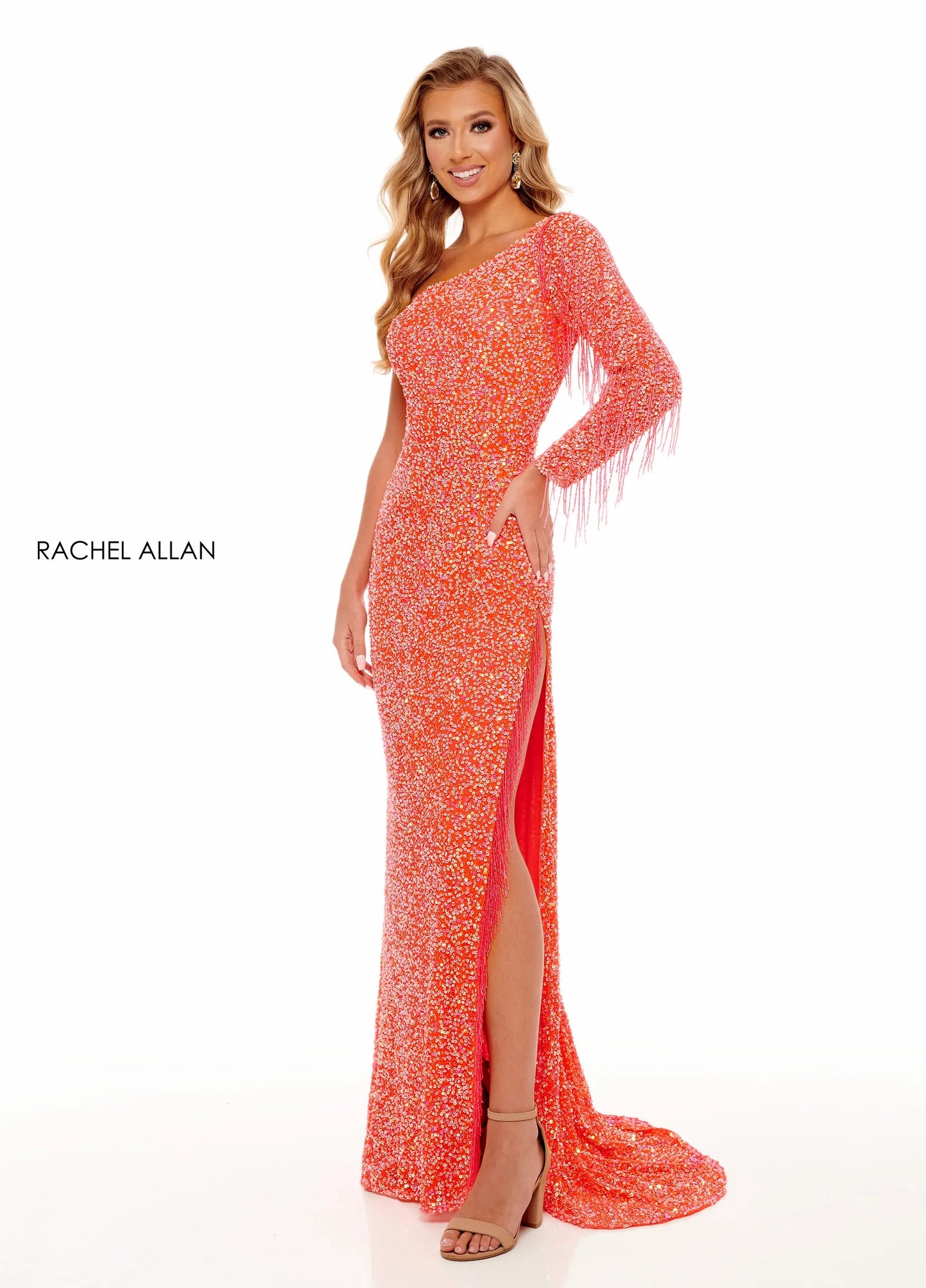 Orange one sleeve sparkling Rachel Allan with fringe detailing 🔥🔥🔥🔥